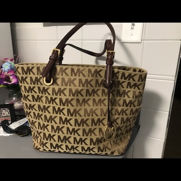 Michael Kors Handbags - MK authentic brown and cream tote